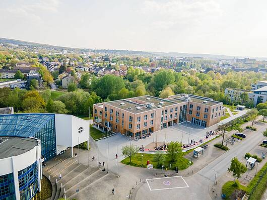 Foto: Luftaufnahme der zentralen Hochschulgebäude der Universität Witten/Herdecke